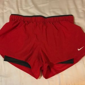 red nike running shorts
